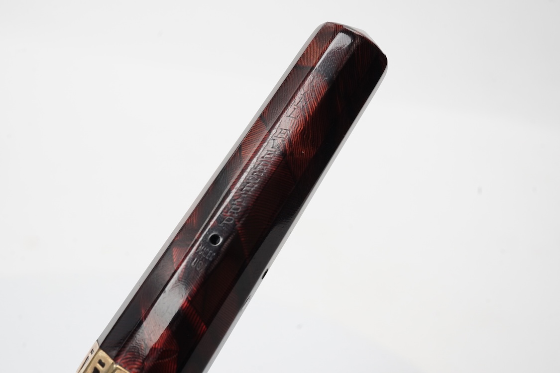 A Wahl Eversharp lever fill 'Doric' fountain pen in garnet colour with gold filled trim